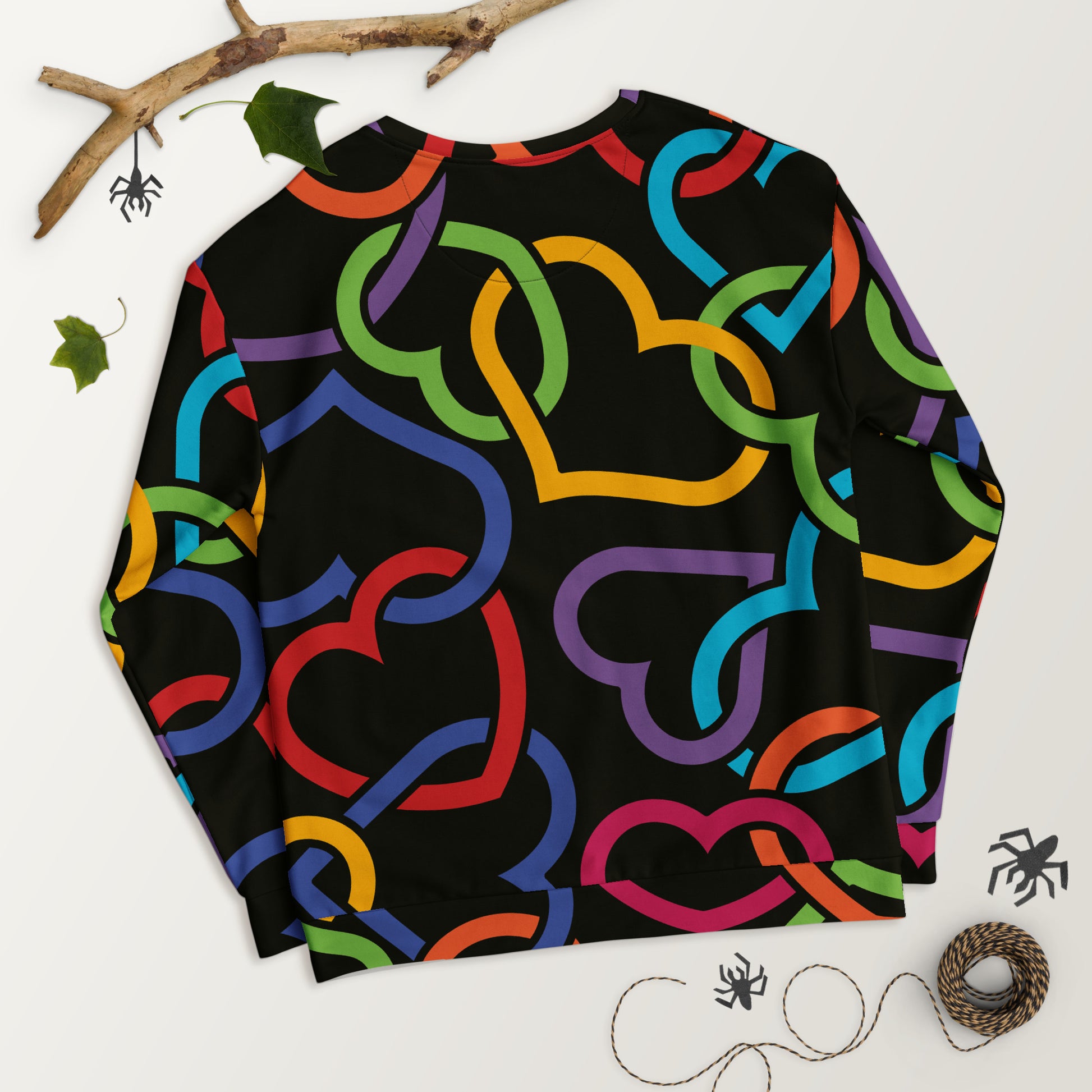 “Model wearing Eddy Ratty all-over print sweatshirt — recycled fabric”